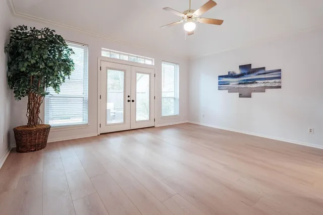 a bathroom with a sink vanity granite and a mirror