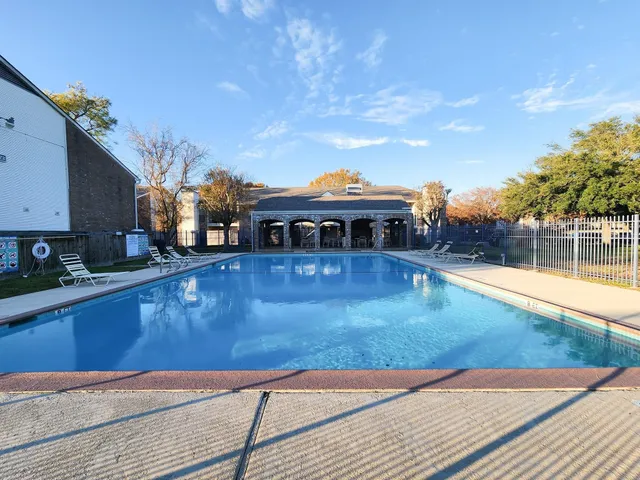 a view of a house with swimming pool
