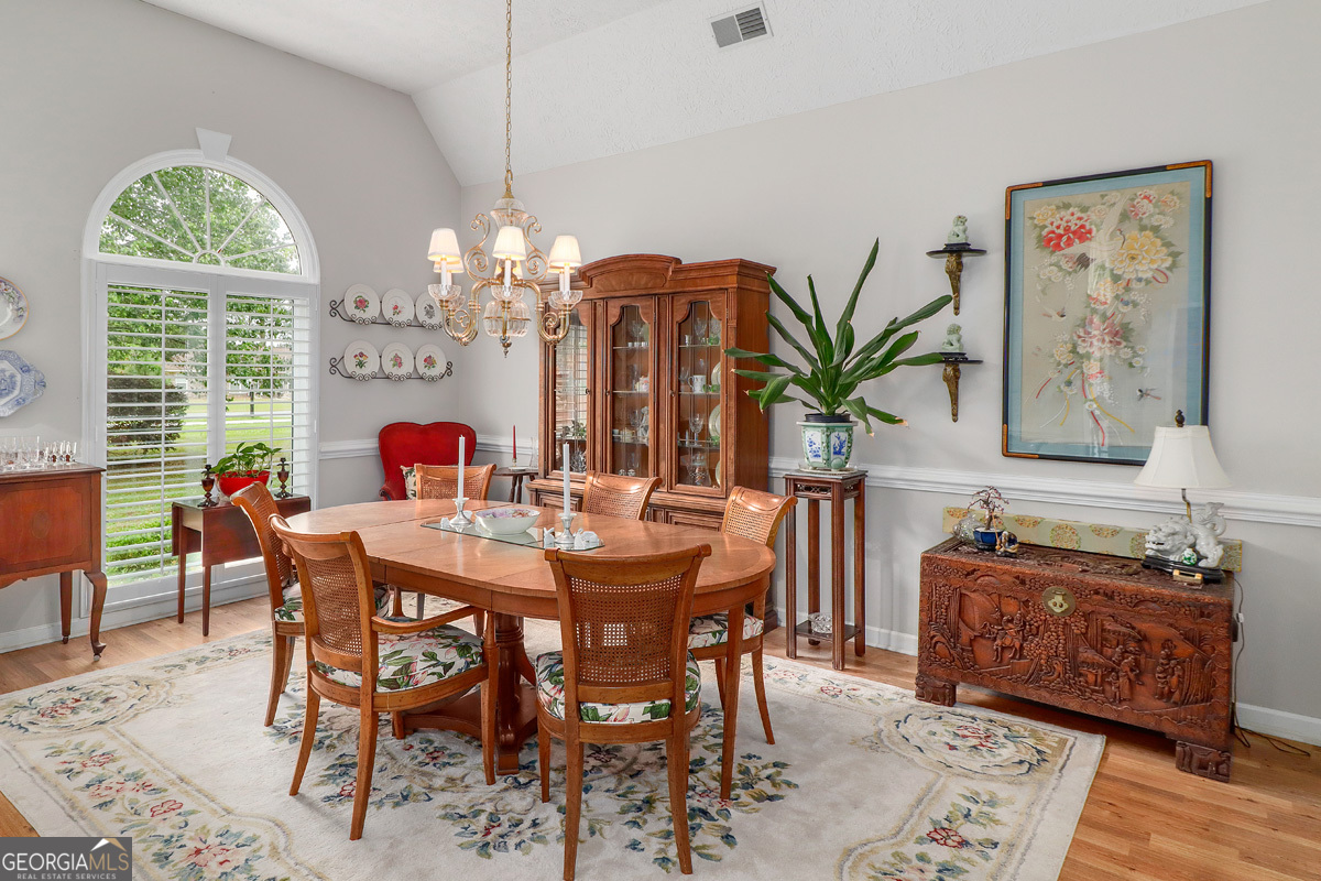 109 St Andrews Road Rincon, GA 31326 - Photo 15 of 52 a view of a dining room with furniture and window
