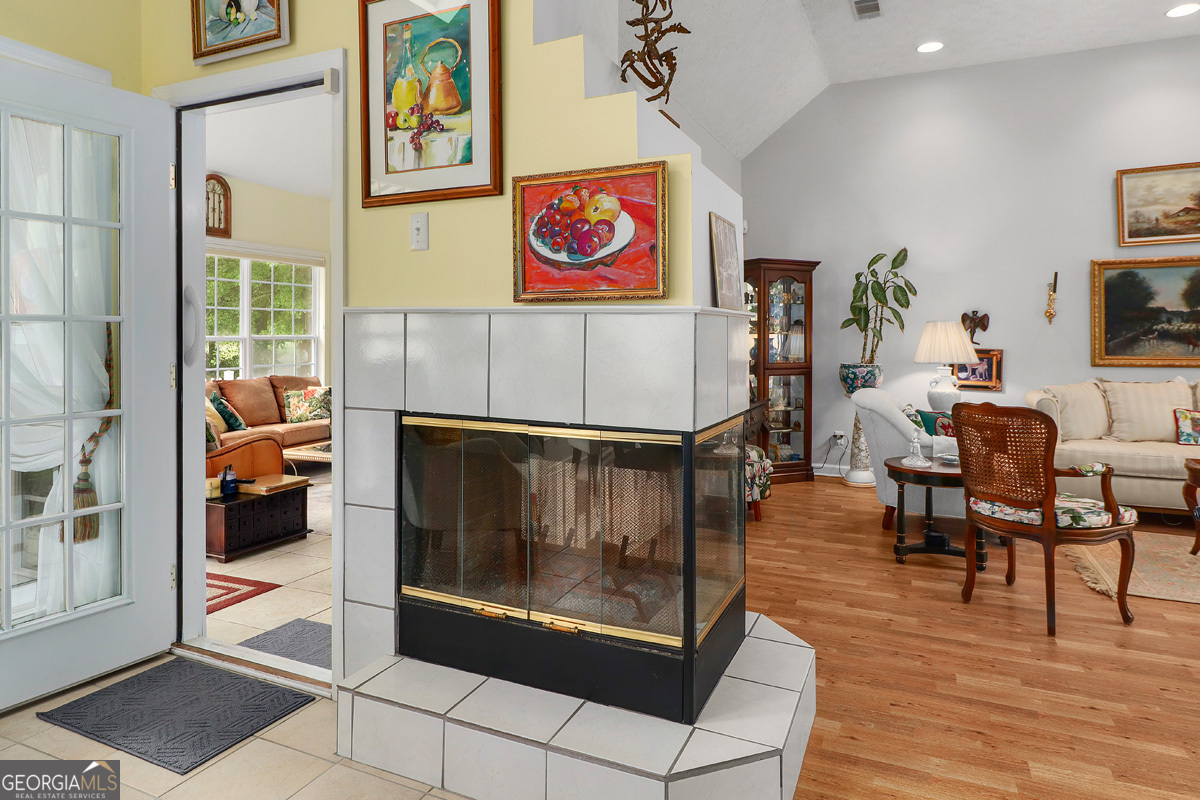 109 St Andrews Road Rincon, GA 31326 - Photo 21 of 52 a view of a hallway with dining area and glass windows