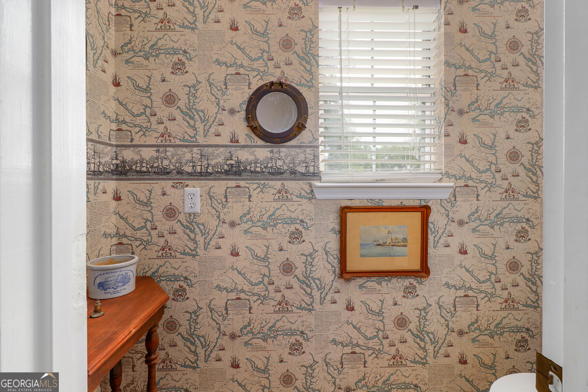 109 St Andrews Road Rincon, GA 31326 - Photo 27 of 52 a building with a granite countertop sink and a window