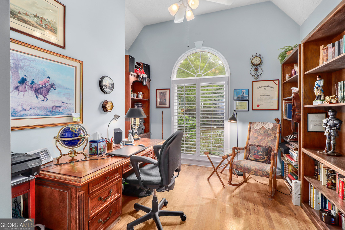 109 St Andrews Road Rincon, GA 31326 - Photo 30 of 52 a view of a workspace with furniture and a large window