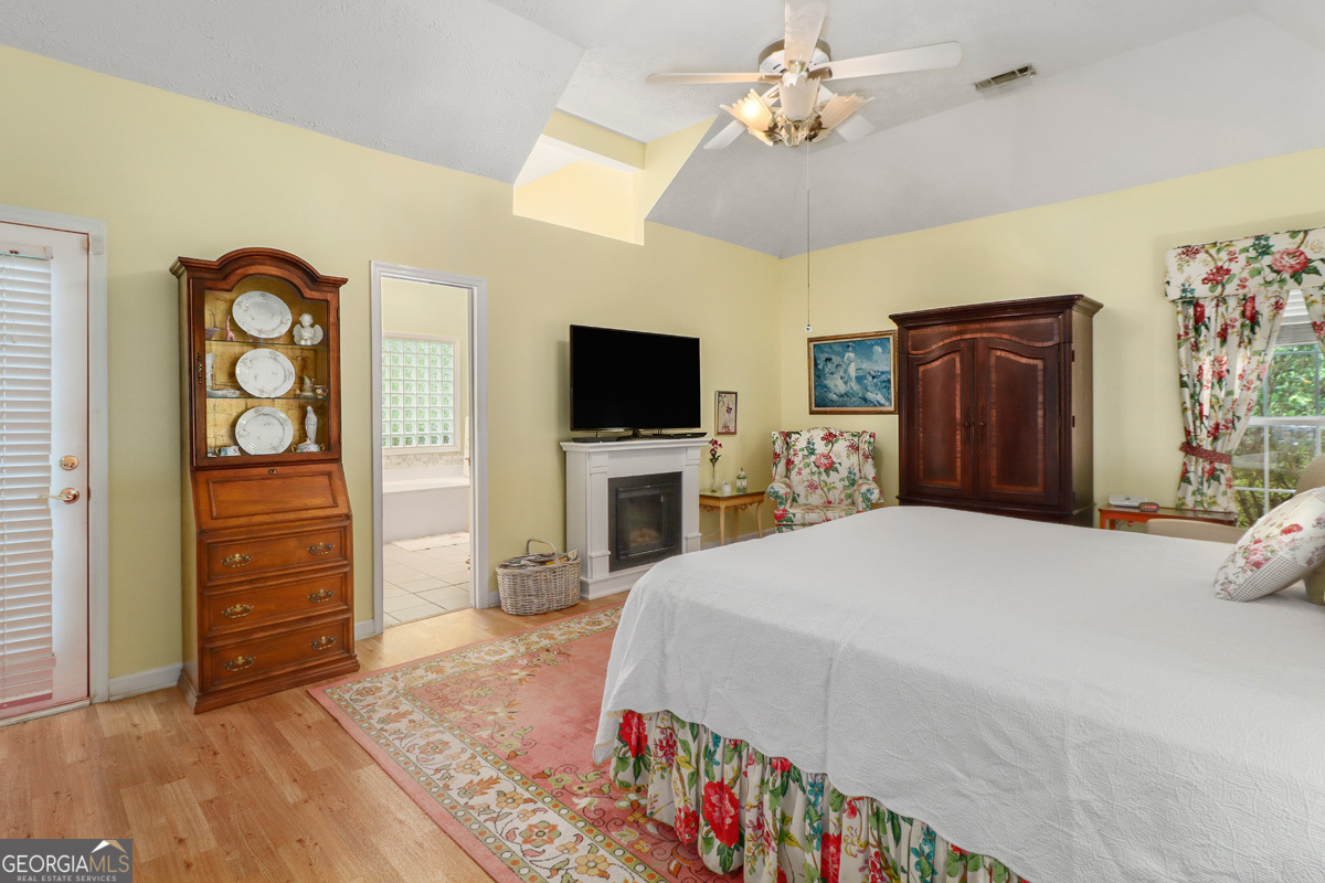 109 St Andrews Road Rincon, GA 31326 - Photo 38 of 52 a bedroom with a bed and a television