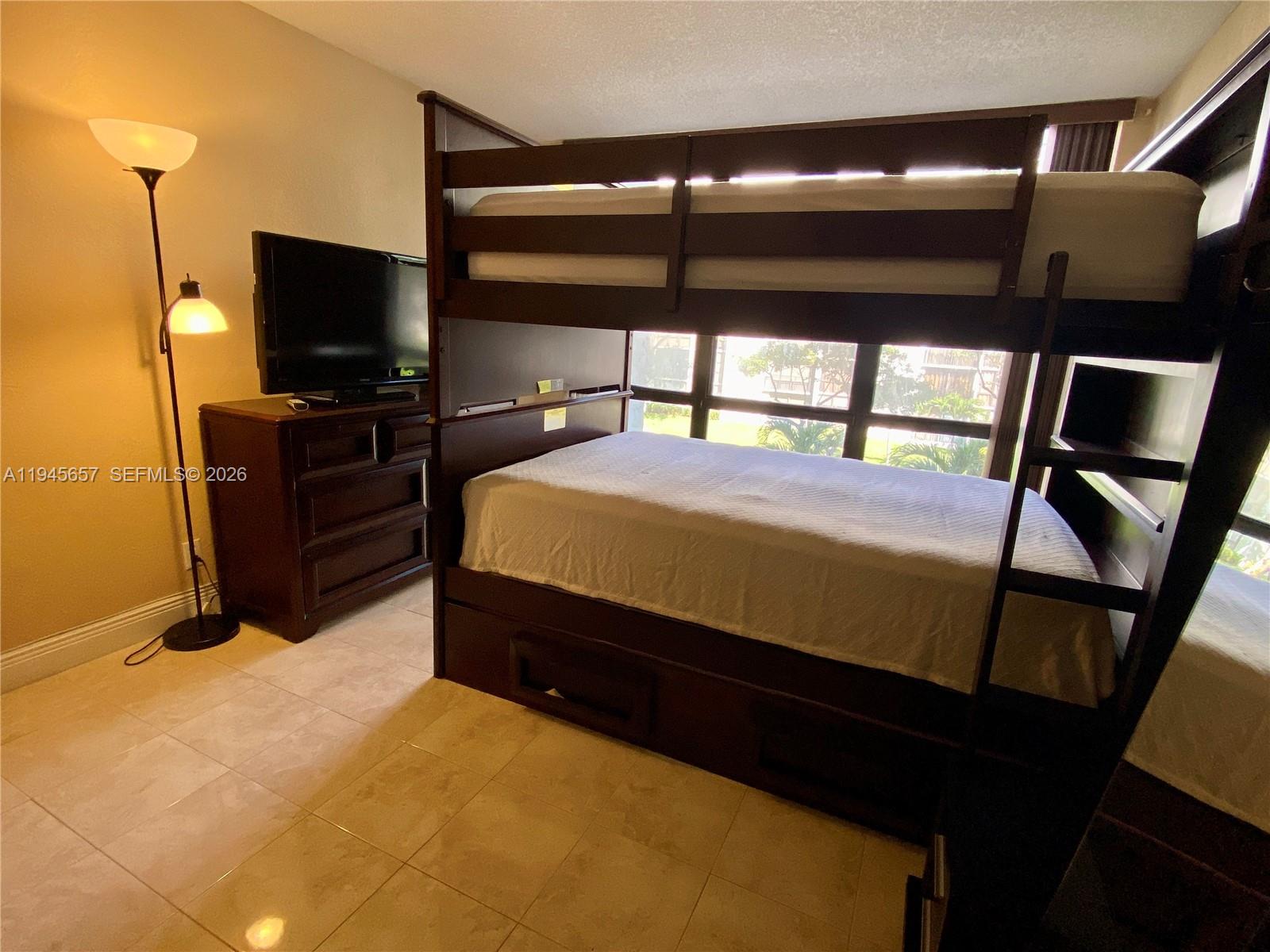 17011 North Bay Road, Unit 304 Sunny Isles Beach, FL 33160 - Photo 33 of 54 a bed room with a bed