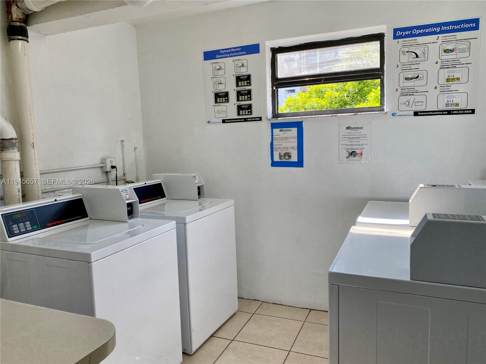 17011 North Bay Road, Unit 304 Sunny Isles Beach, FL 33160 - Photo 37 of 54 a utility room with dryer and washer