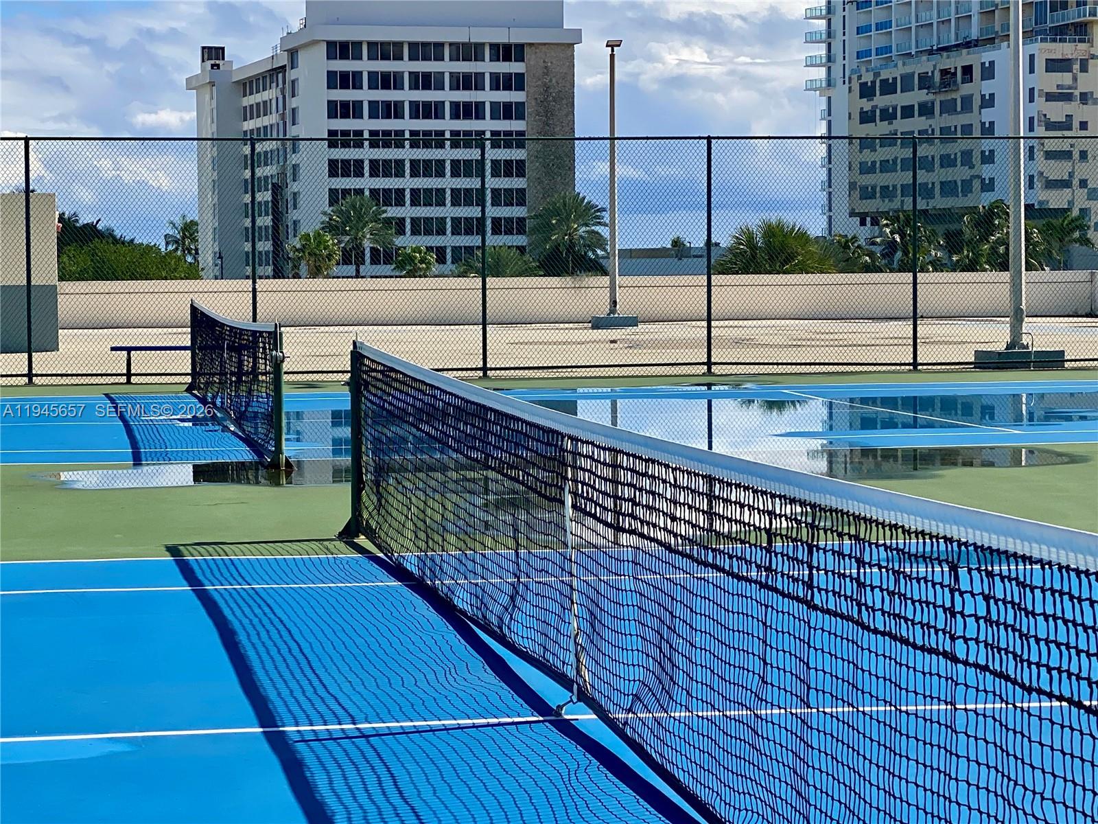 17011 North Bay Road, Unit 304 Sunny Isles Beach, FL 33160 - Photo 46 of 54 a view of outdoor space with swimming pool