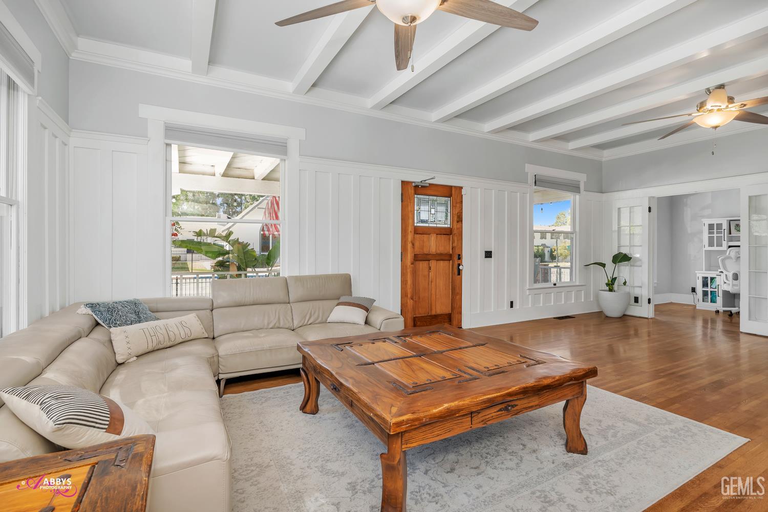 Undisclosed Address Bakersfield, CA 93301 - Photo 12 of 58 a living room with furniture and a table