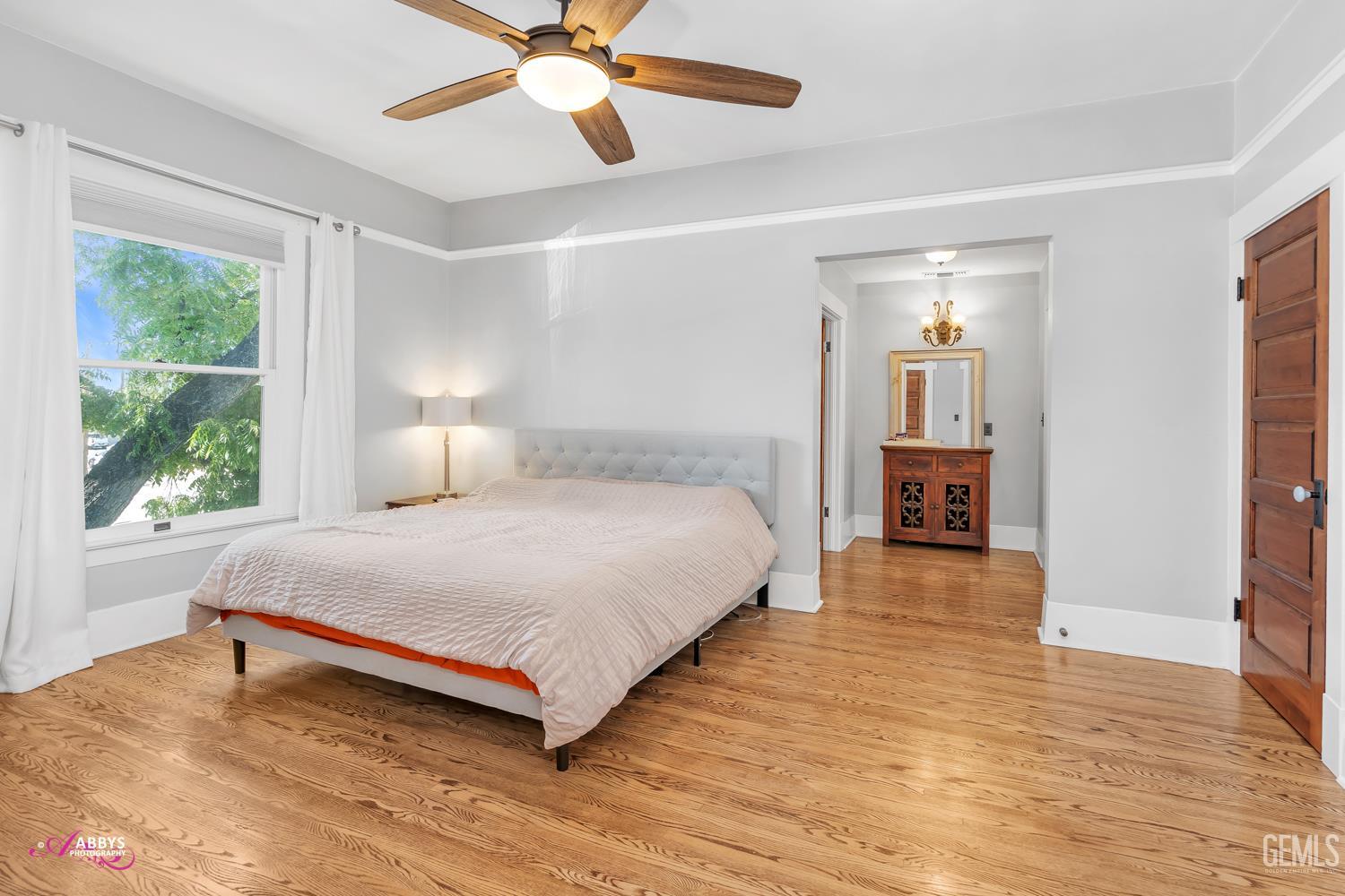 Undisclosed Address Bakersfield, CA 93301 - Photo 25 of 58 a bedroom with a bed and window