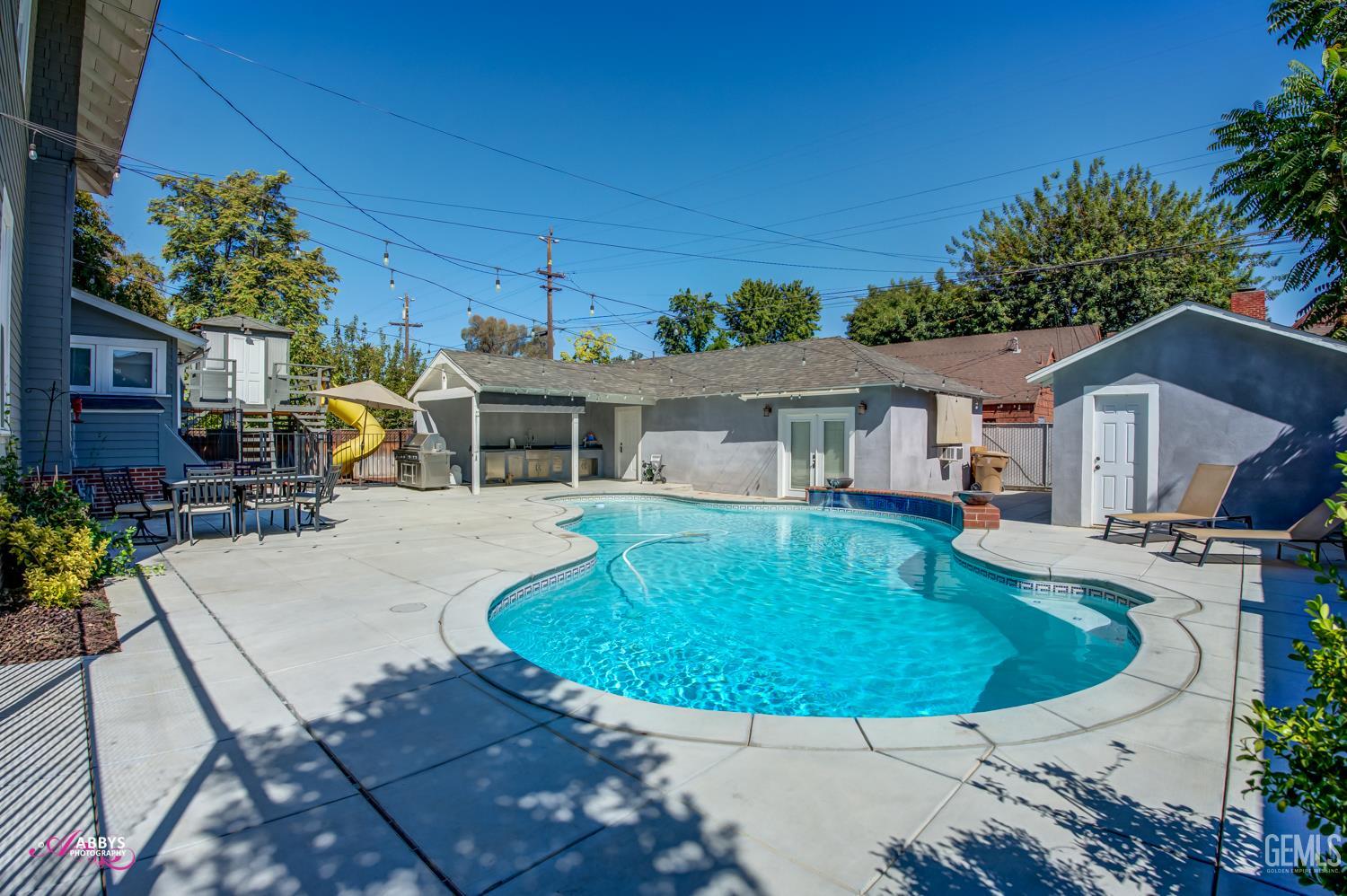 Undisclosed Address Bakersfield, CA 93301 - Photo 40 of 58 front view of house with a chairs