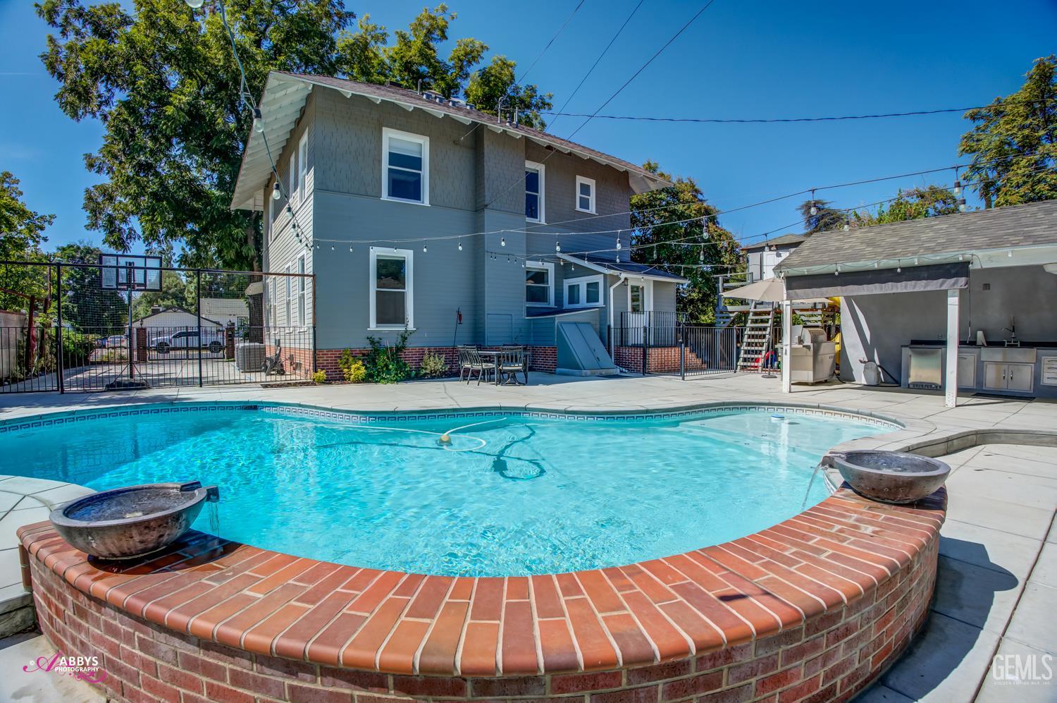 Undisclosed Address Bakersfield, CA 93301 - Photo 42 of 58 a view of a backyard with sitting area