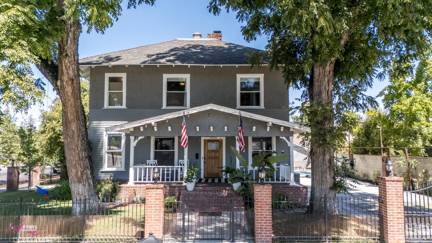 Undisclosed Address Bakersfield, CA 93301 - Photo 57 of 58 a front view of a house with a yard