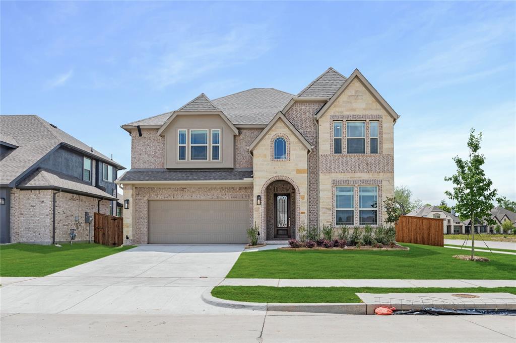 3002 Wild River Road Melissa, TX 75454 - Photo 3 of 36 a front view of a house with a yard