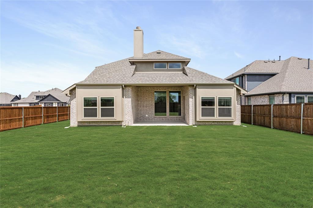 3002 Wild River Road Melissa, TX 75454 - Photo 34 of 36 a front view of a house with a garden