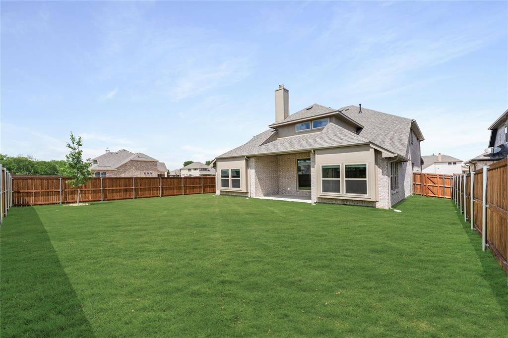 3002 Wild River Road Melissa, TX 75454 - Photo 35 of 36 a front view of a house with a yard