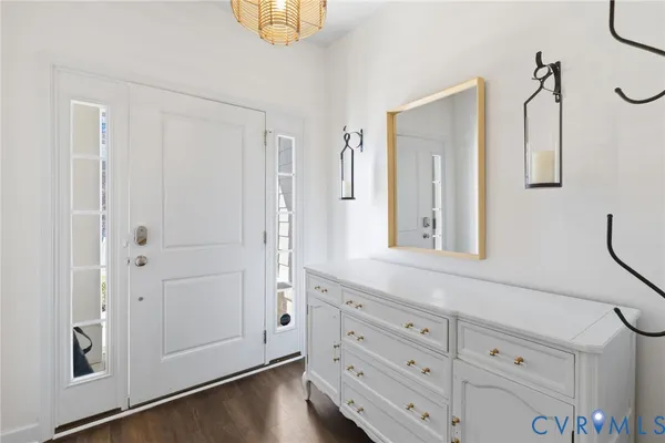 a bathroom with a double vanity sink and mirror