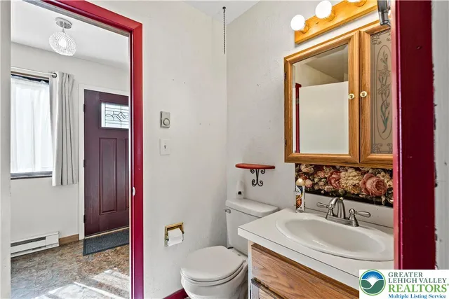 a view of an empty room with a floor to ceiling window