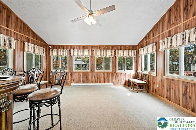 a view of a room with window and floor to ceiling window