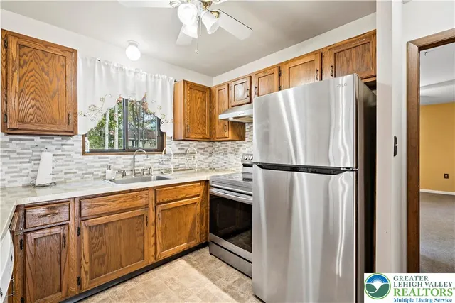 a view of a livingroom with furniture and window