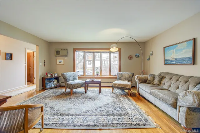 a living room with furniture and window