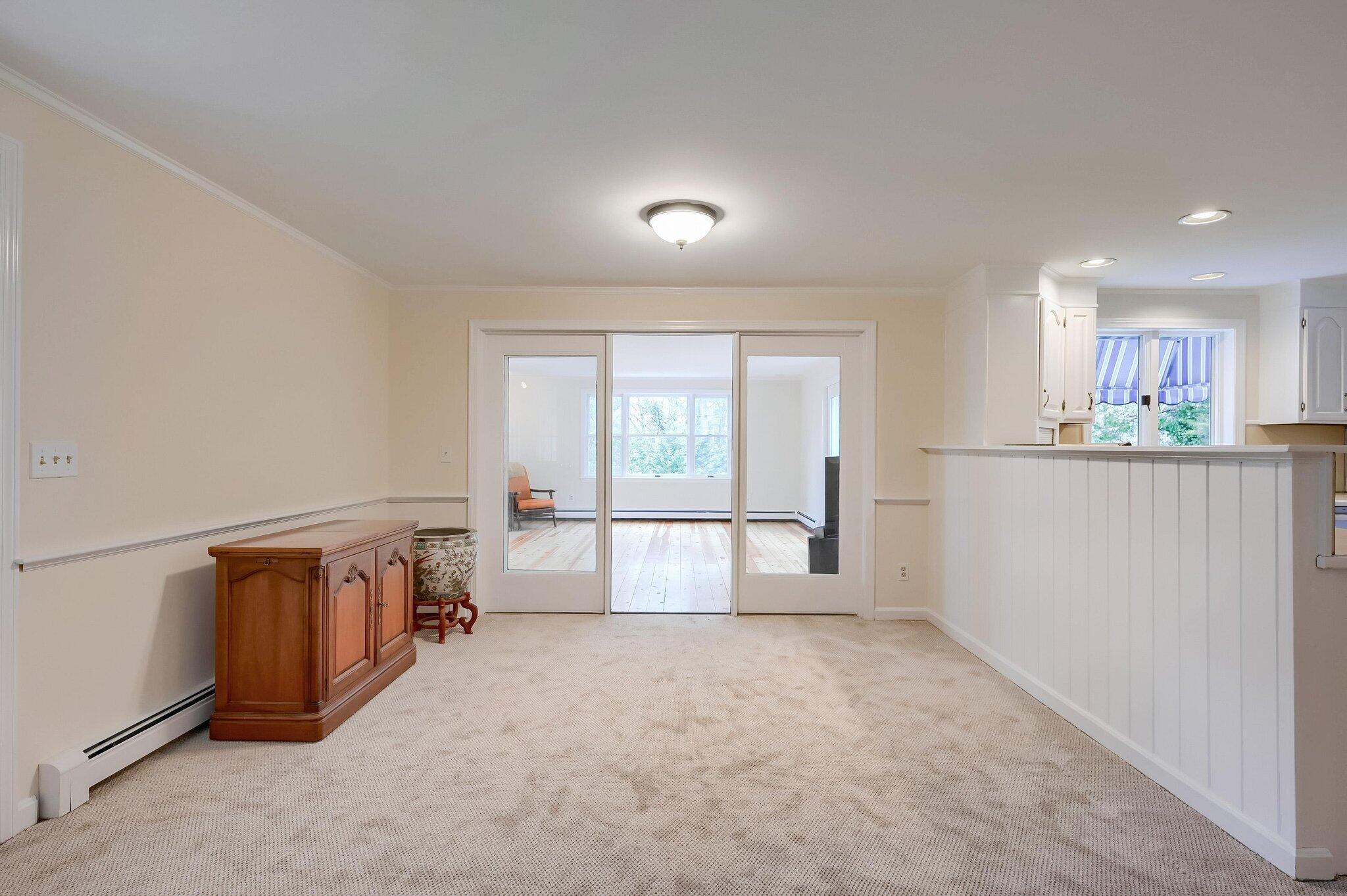 40 Barley Neck Road Orleans, MA 02653 - Photo 13 of 51 wooden floor in an empty room with a window