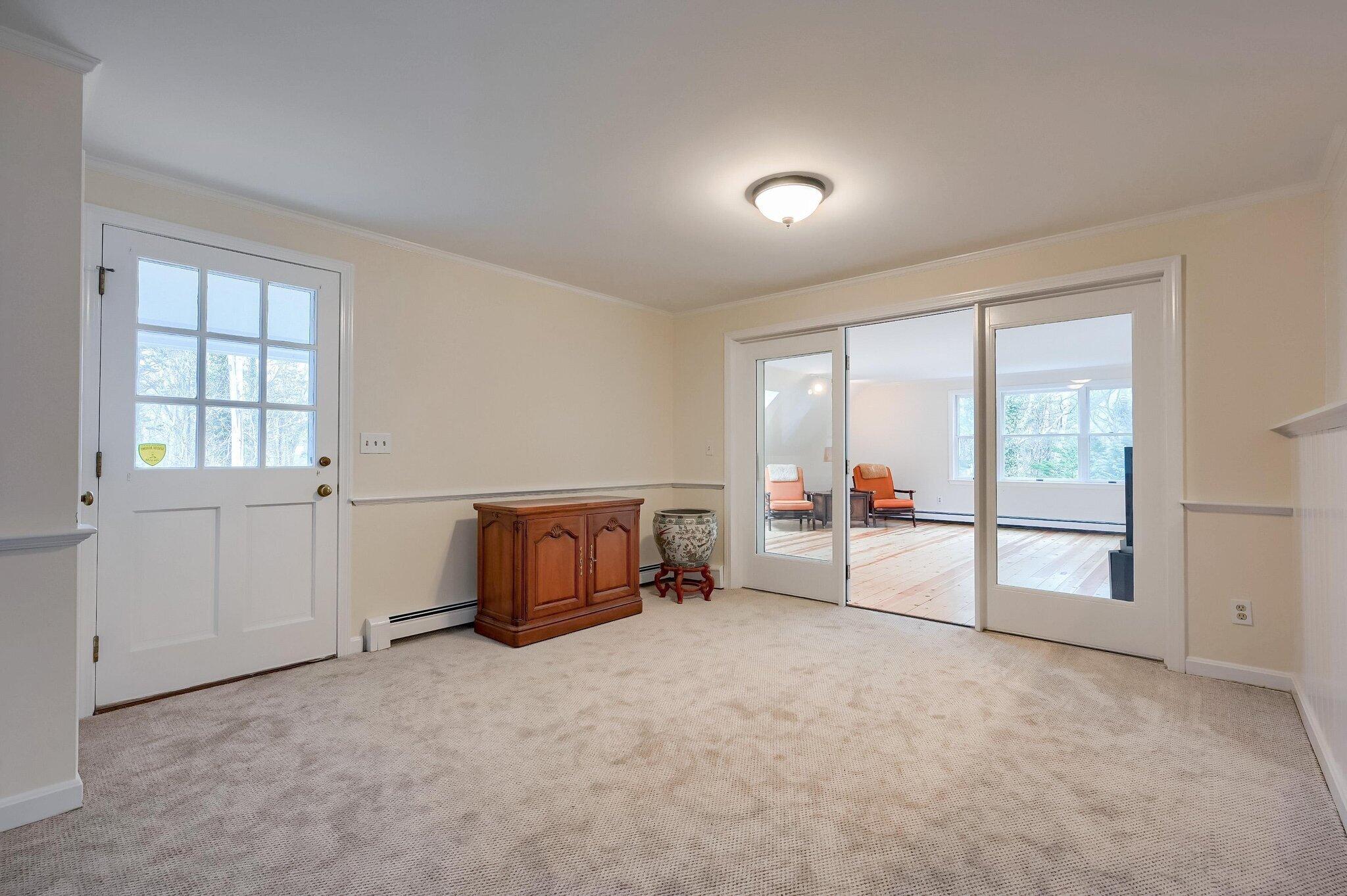 40 Barley Neck Road Orleans, MA 02653 - Photo 14 of 51 an empty room with windows