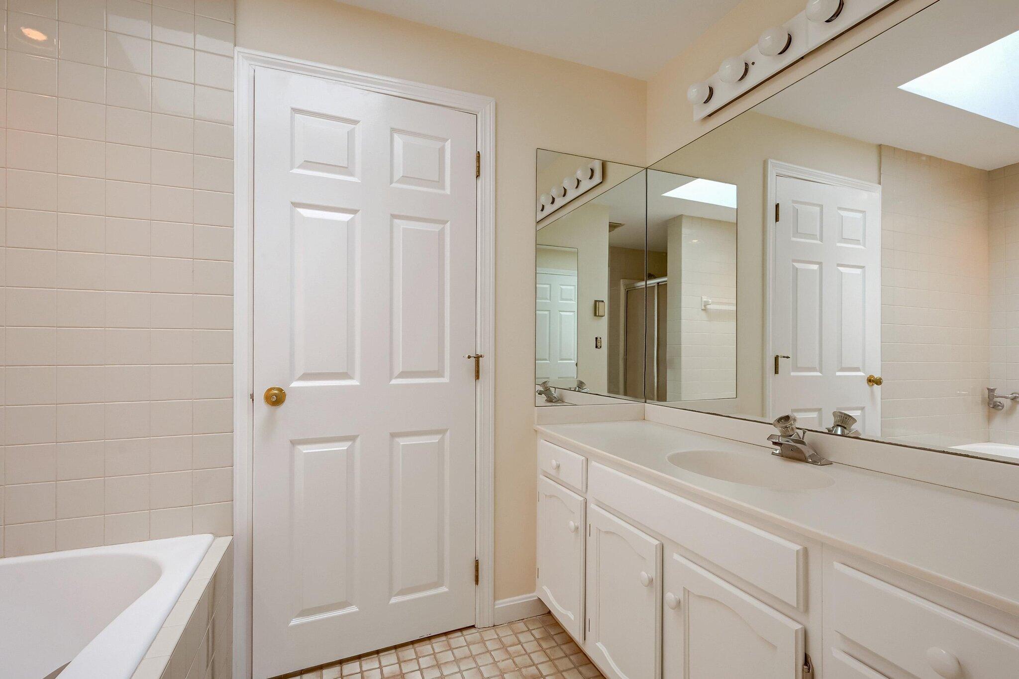 40 Barley Neck Road Orleans, MA 02653 - Photo 27 of 51 a bathroom with a sink and a mirror