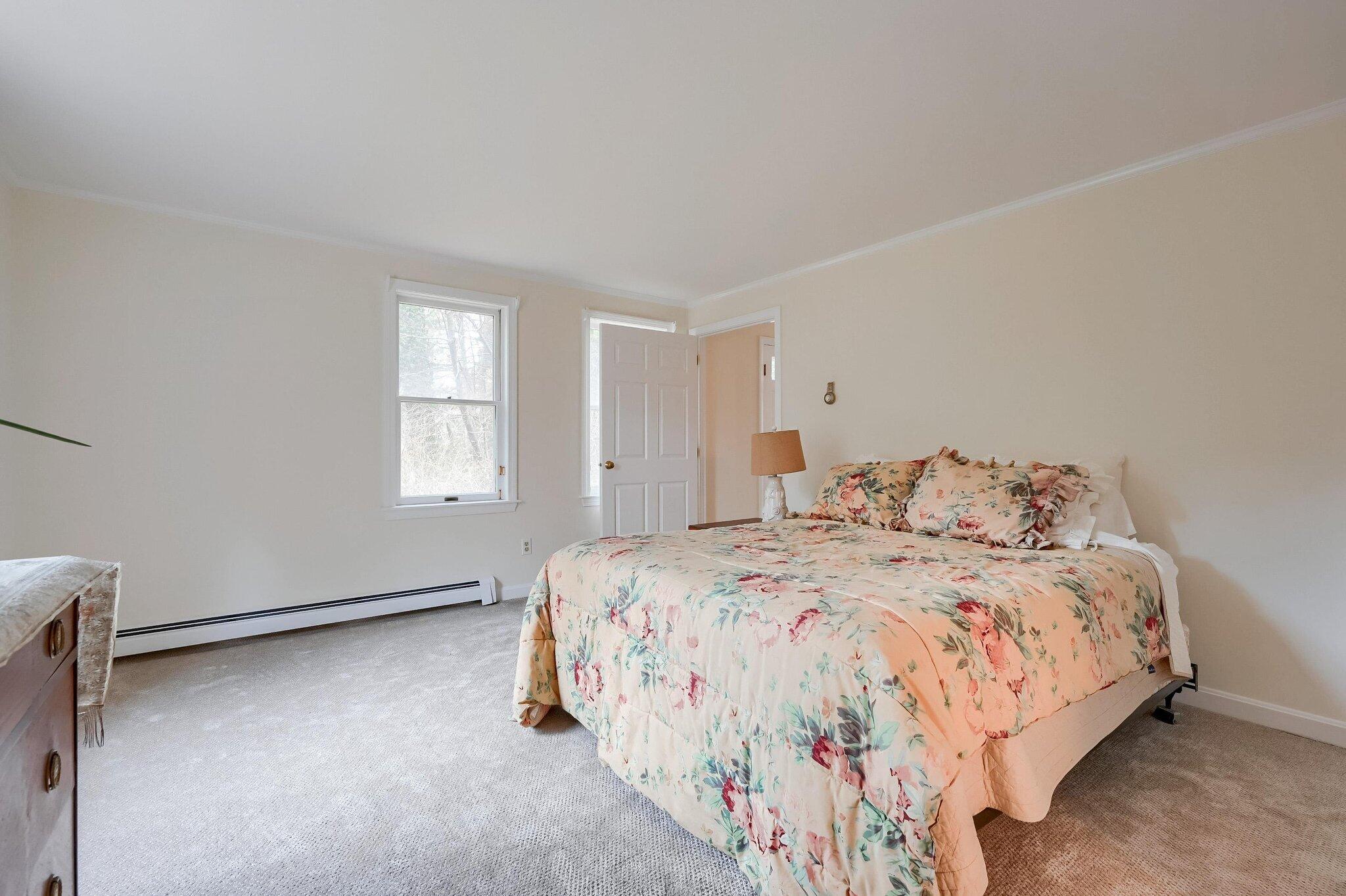 40 Barley Neck Road Orleans, MA 02653 - Photo 29 of 51 a bedroom with a bed and a window