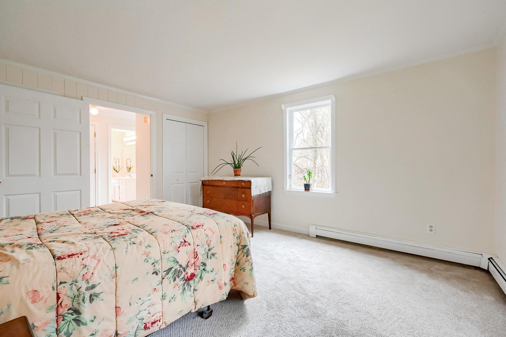 40 Barley Neck Road Orleans, MA 02653 - Photo 31 of 51 a bedroom with a bed and a window