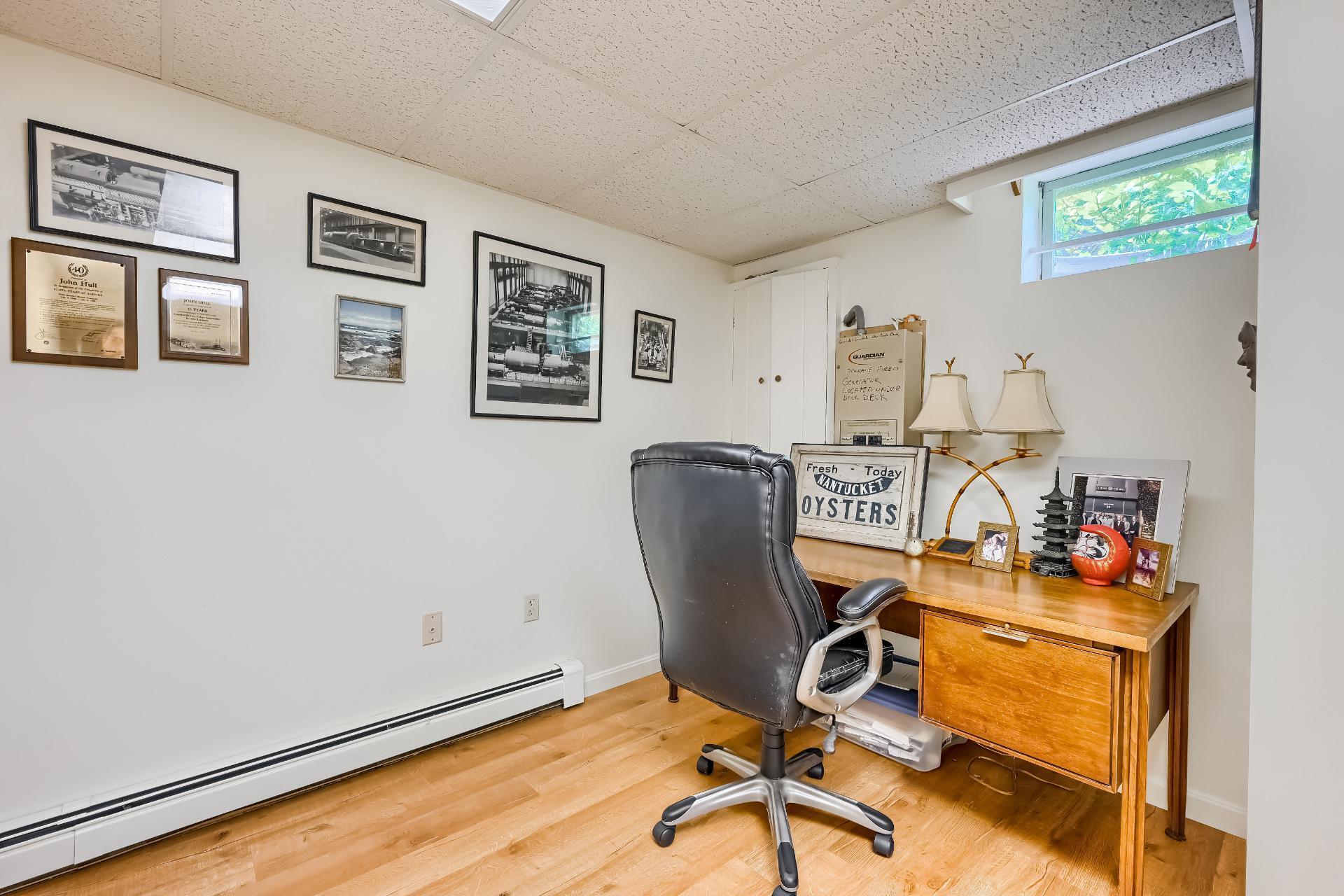 40 Barley Neck Road Orleans, MA 02653 - Photo 34 of 51 a view of a workspace with furniture and a window
