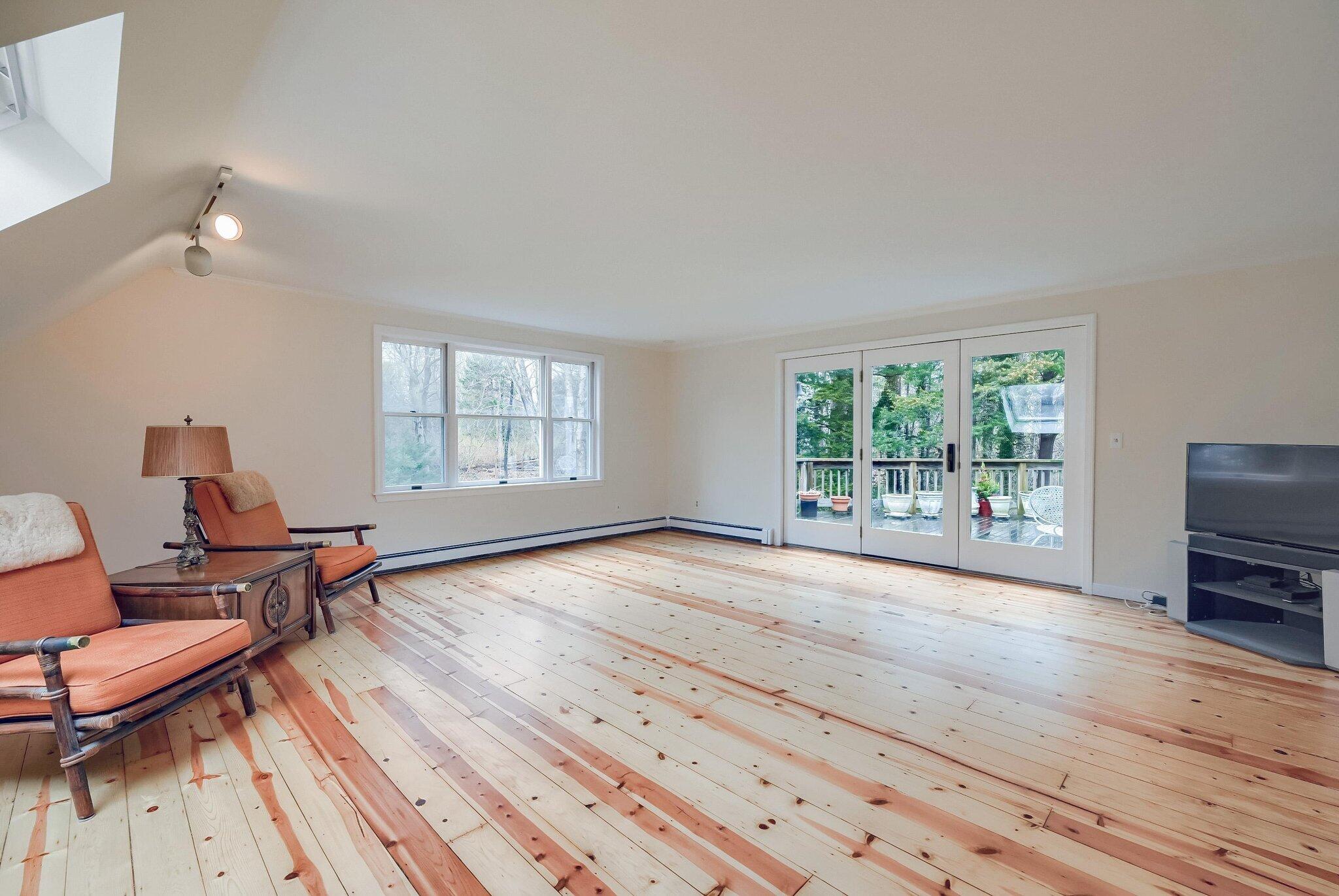 40 Barley Neck Road Orleans, MA 02653 - Photo 4 of 51 a view of livingroom with furniture window and wooden floor