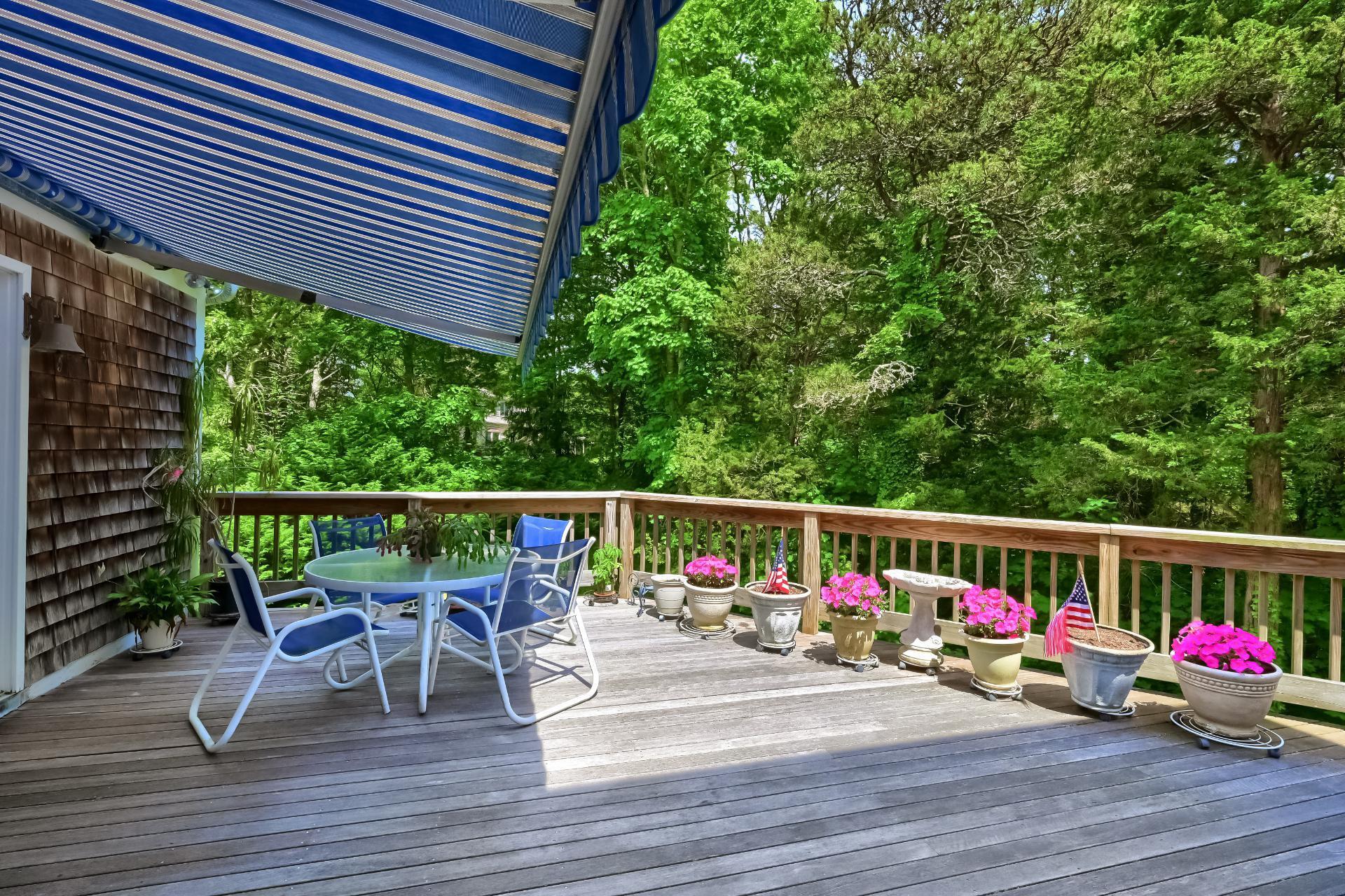 40 Barley Neck Road Orleans, MA 02653 - Photo 41 of 51 a view of outdoor dining space with furniture and wooden floor