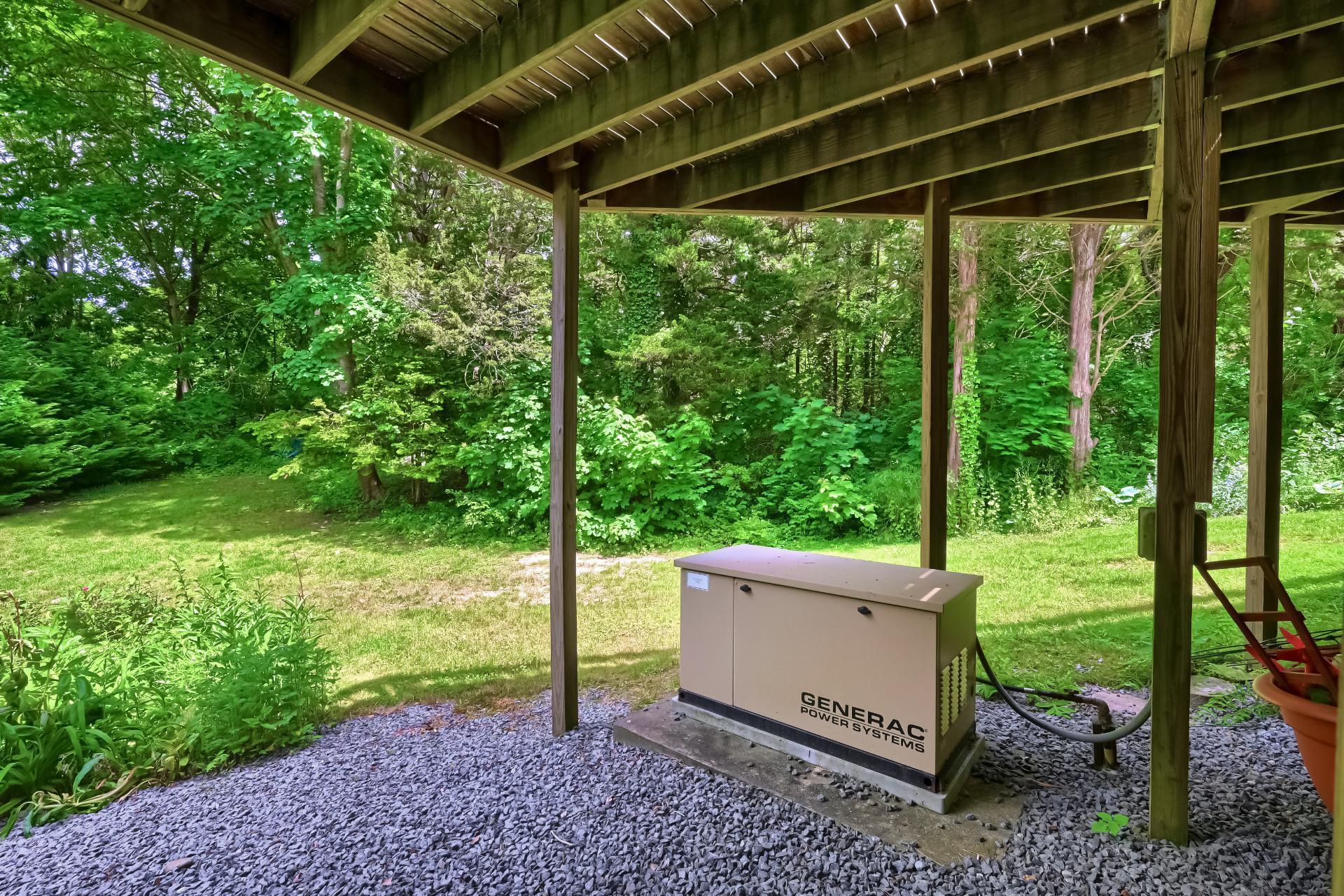 40 Barley Neck Road Orleans, MA 02653 - Photo 49 of 51 a view of a backyard with plants and garden