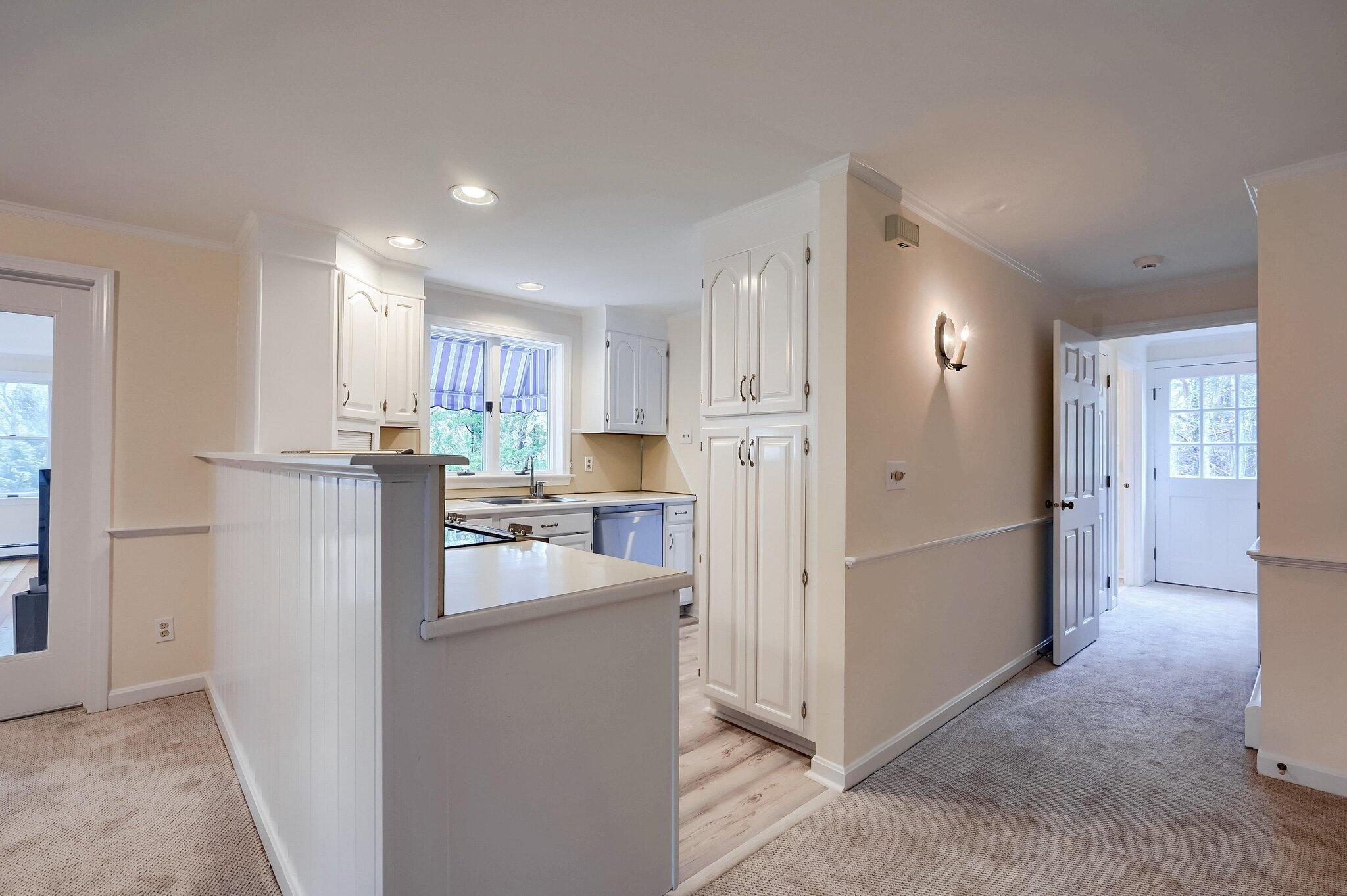 40 Barley Neck Road Orleans, MA 02653 - Photo 10 of 51 a kitchen with refrigerator and cabinets