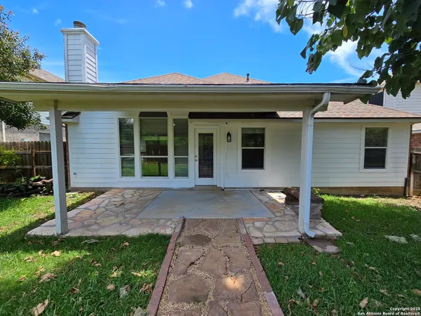 a backyard of a house with lots of green space