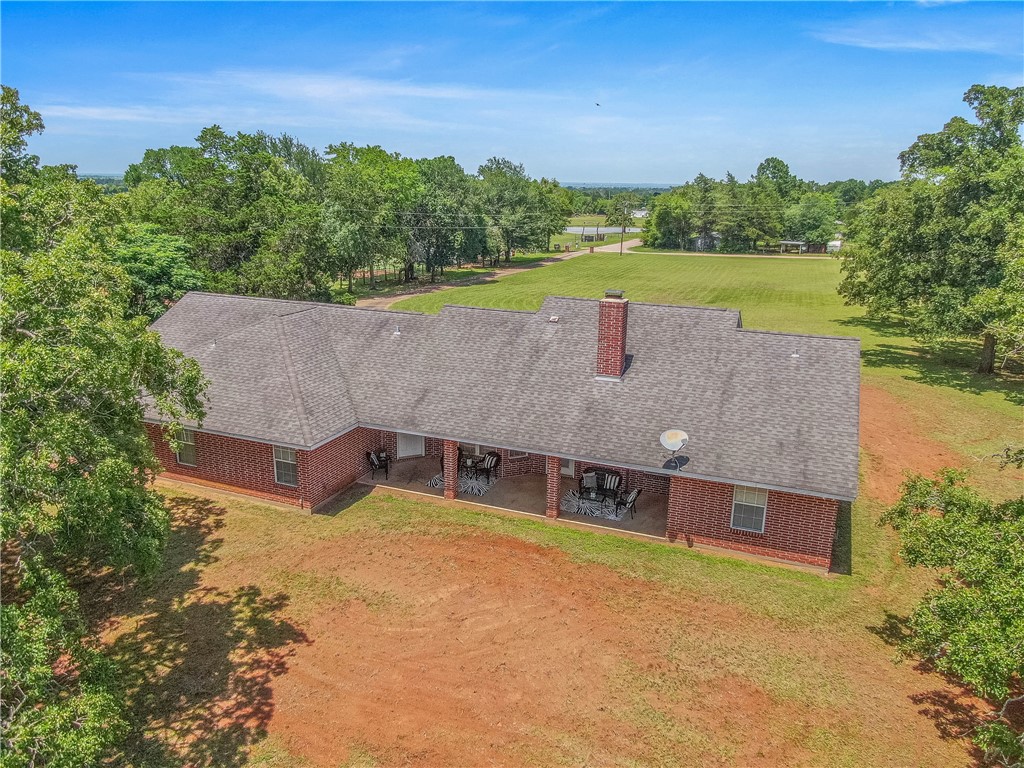 1110 County Road 439 Dime Box, TX 77853 - Photo 48 of 50 an aerial view of a house with a yard