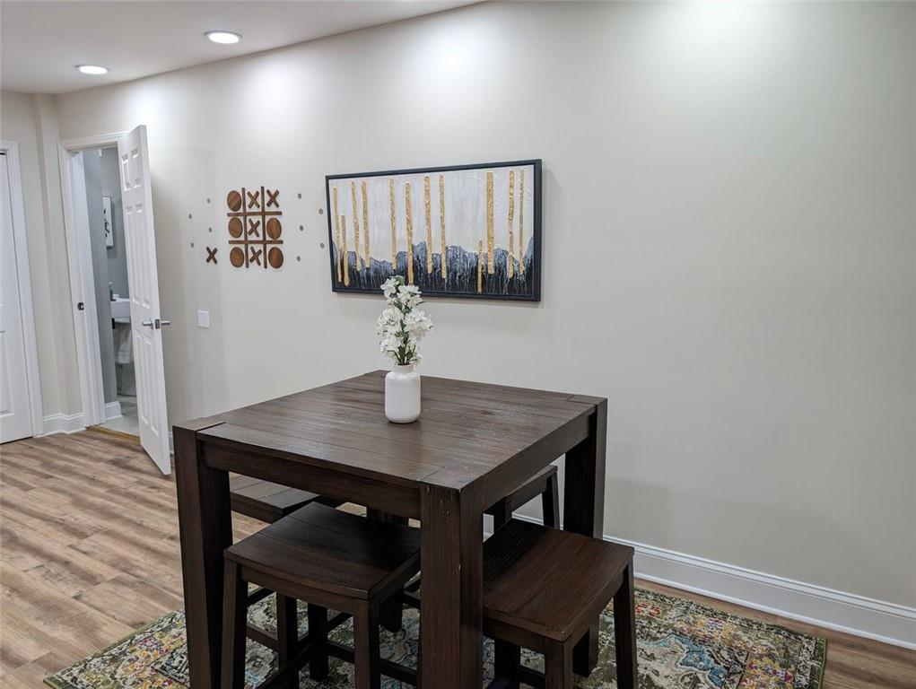 1303 Colony Drive, Unit C Marietta, GA 30068 - Photo 17 of 18 a view of a room with a table and chairs