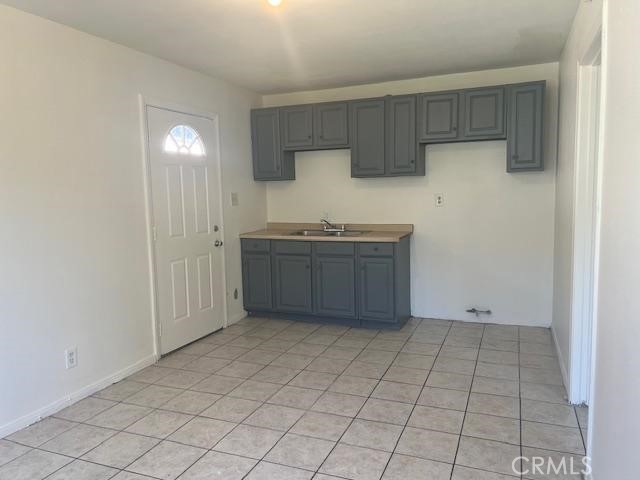 12729 Judd Street Pacoima, CA 91331 - Photo 11 of 14 a kitchen with stainless steel appliances granite countertop a sink and cabinets