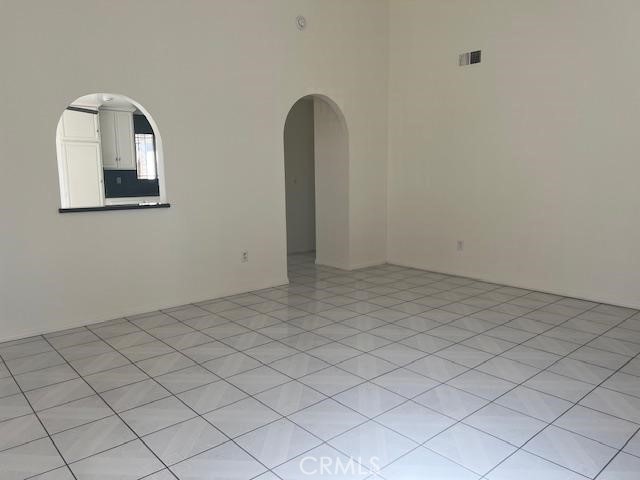 12729 Judd Street Pacoima, CA 91331 - Photo 7 of 14 an empty room with a window