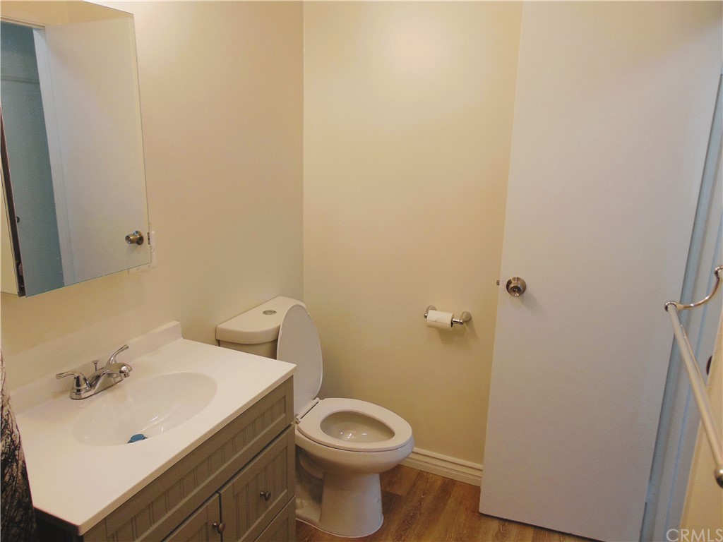 420 West 67th Way Long Beach, CA 90805 - Photo 15 of 21 a bathroom with a sink and a toilet
