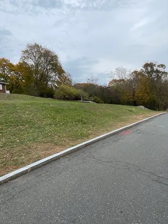 a view of an outdoor space and tennis court