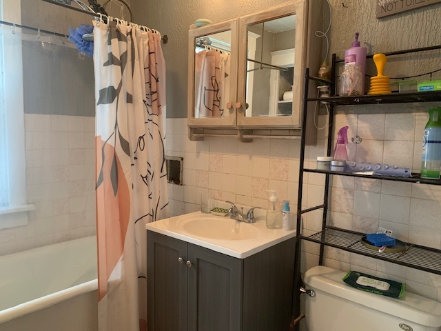 514 Marcy Street Ottawa, IL 61350 - Photo 19 of 54 a bathroom with a sink and a mirror