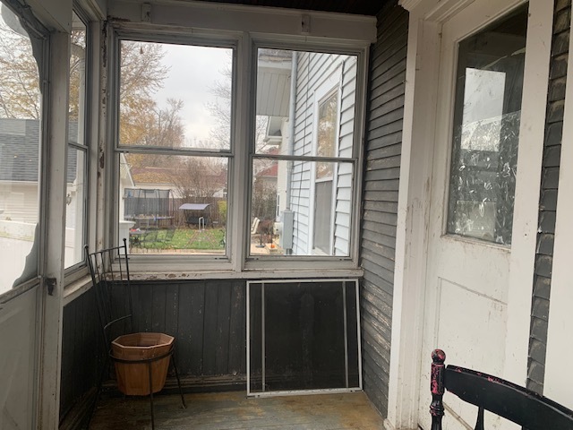 514 Marcy Street Ottawa, IL 61350 - Photo 27 of 54 a living room with a large window and a sink