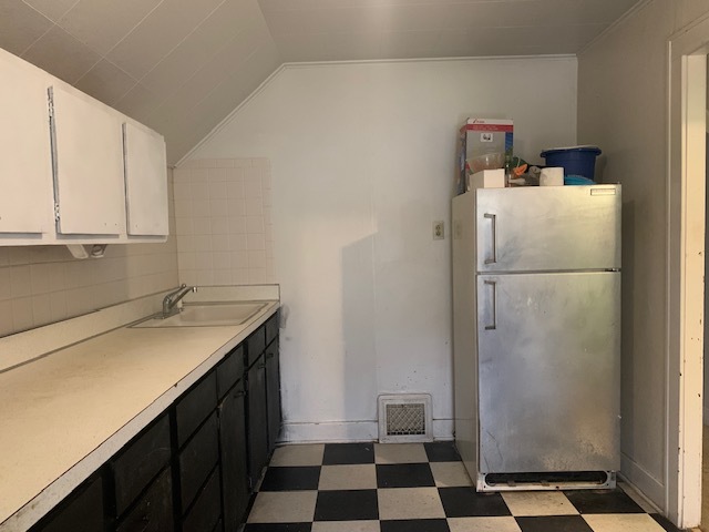 514 Marcy Street Ottawa, IL 61350 - Photo 35 of 54 a kitchen with a refrigerator and a sink