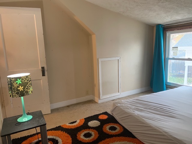 514 Marcy Street Ottawa, IL 61350 - Photo 42 of 54 a bedroom with a bed and a window