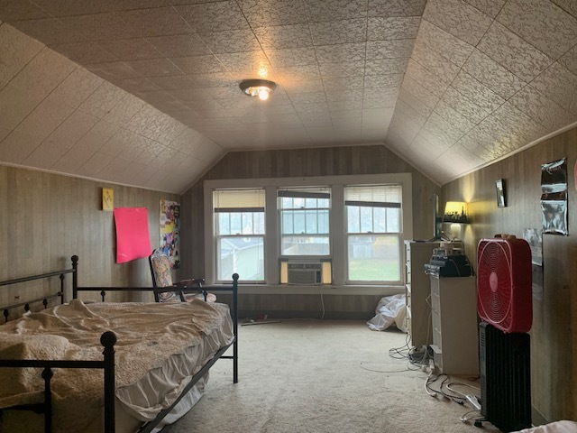 514 Marcy Street Ottawa, IL 61350 - Photo 48 of 54 a living room with furniture a rug and gym equipment