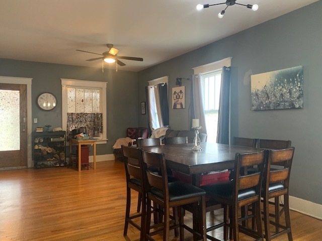 514 Marcy Street Ottawa, IL 61350 - Photo 7 of 54 a view of a dining room with furniture and wooden floor