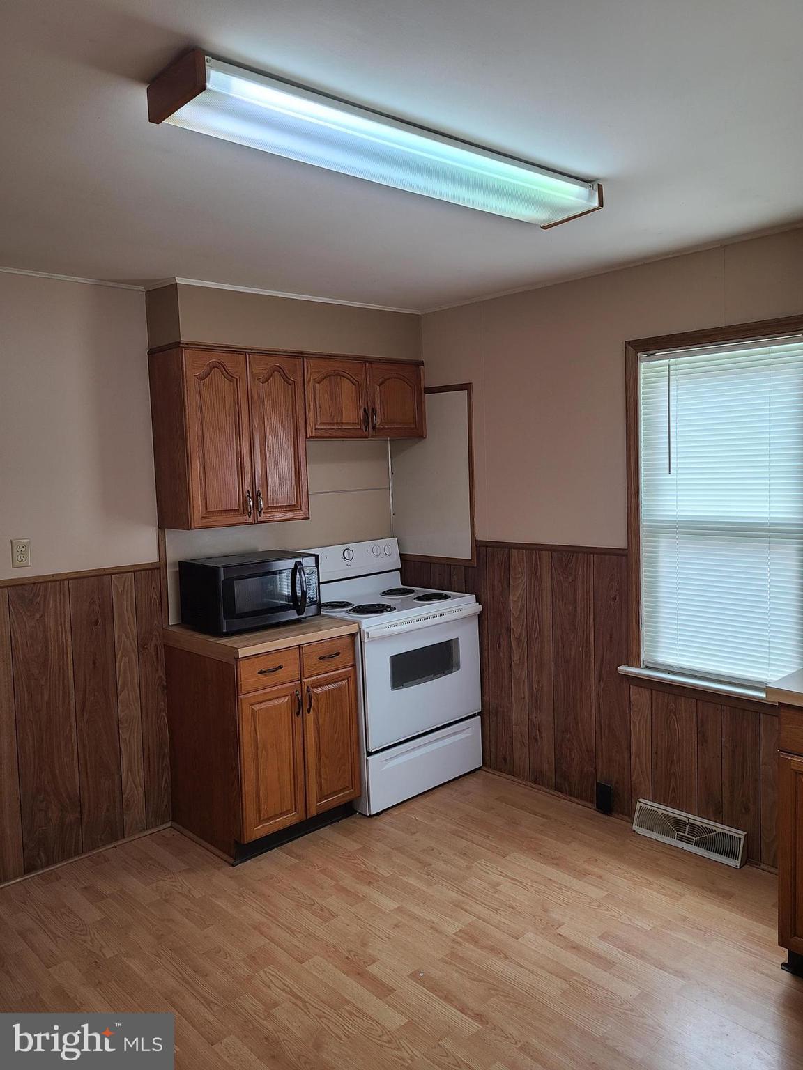 16 Waterworks Road Salem, NJ 08079 - Photo 2 of 11 a kitchen with stainless steel appliances granite countertop a stove a sink and a refrigerator