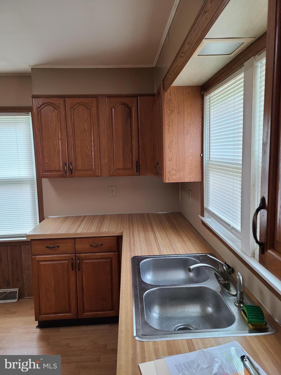 16 Waterworks Road Salem, NJ 08079 - Photo 3 of 11 a kitchen with a sink cabinets and a window