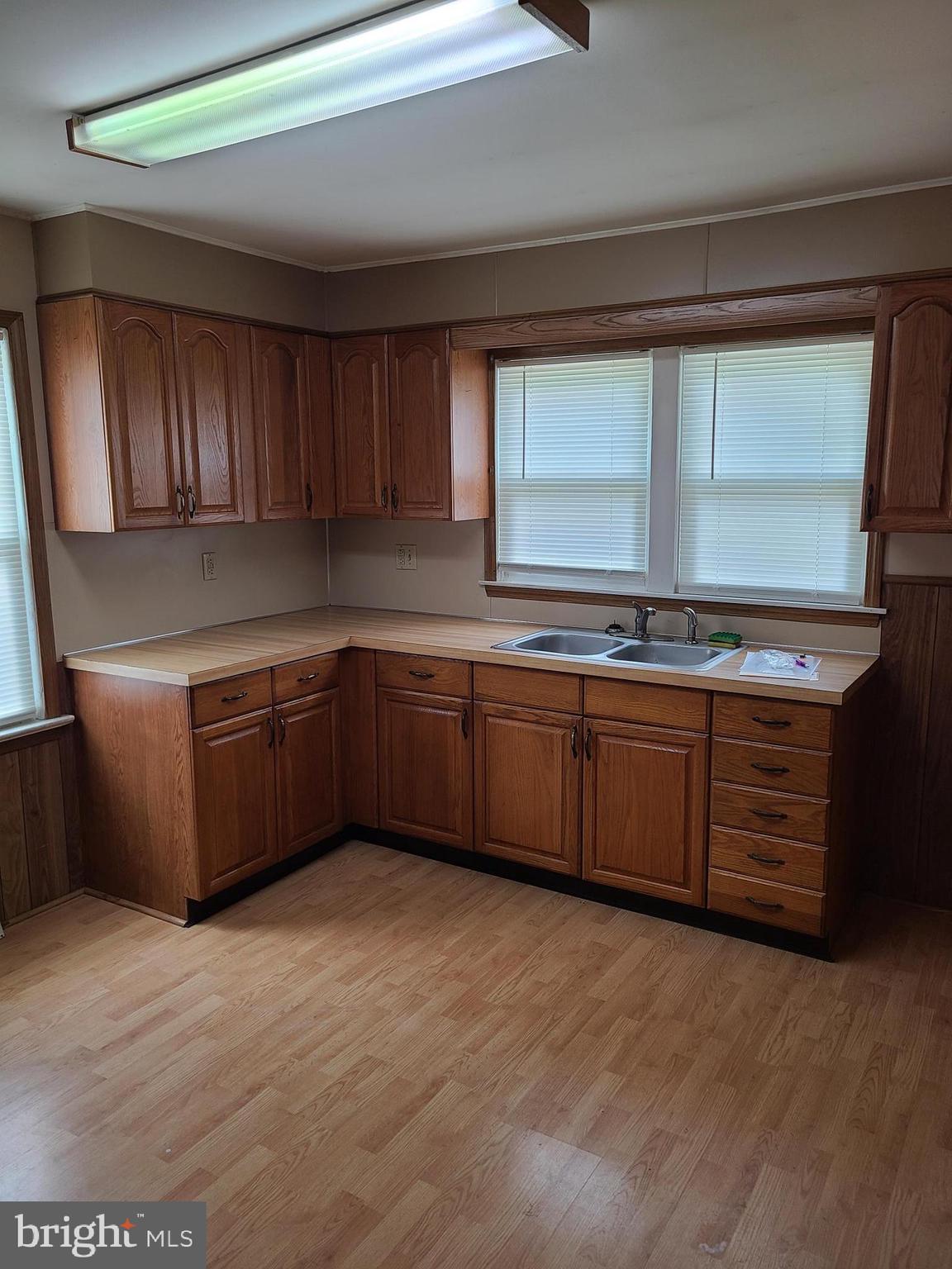 16 Waterworks Road Salem, NJ 08079 - Photo 8 of 11 a kitchen with stainless steel appliances kitchen island granite countertop a stove a sink and a microwave