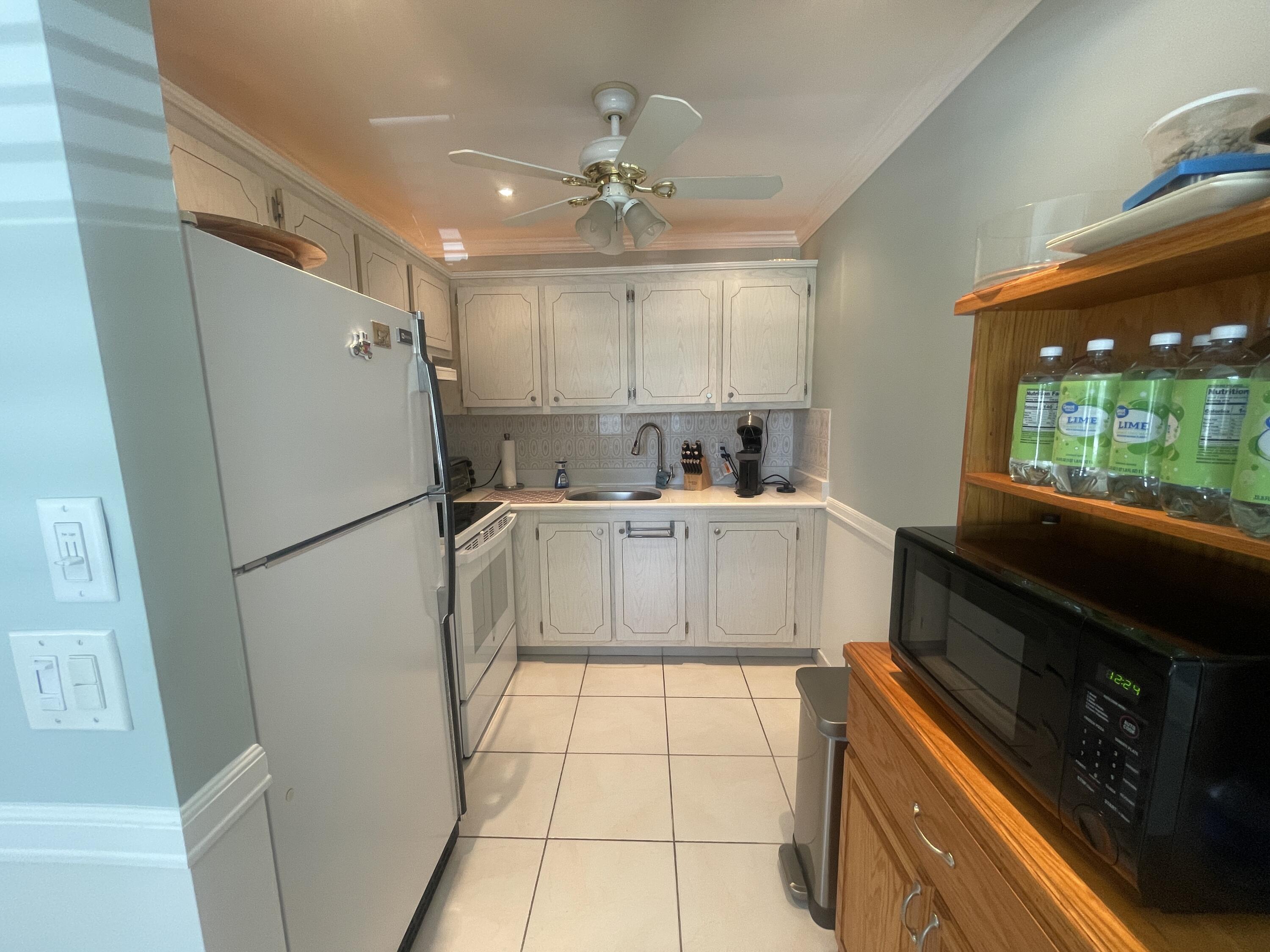 3100 Springdale Boulevard, Unit 214 Palm Springs, FL 33461 - Photo 1 of 21 Kitchen
